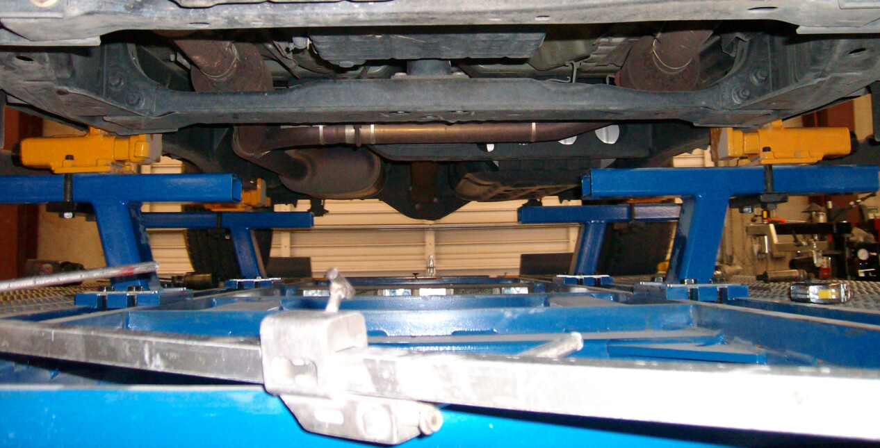 truck frame anchored kmv clamps under car o liner